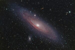 A captivating view of the Andromeda Galaxy surrounded by stars in the vast cosmos.